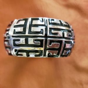 1inch wide Black and gold tone hinge bangle